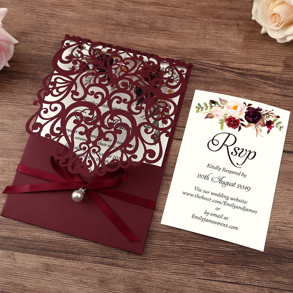 Burgundy laser cut invitation with a hanging pearl - Invitationcards