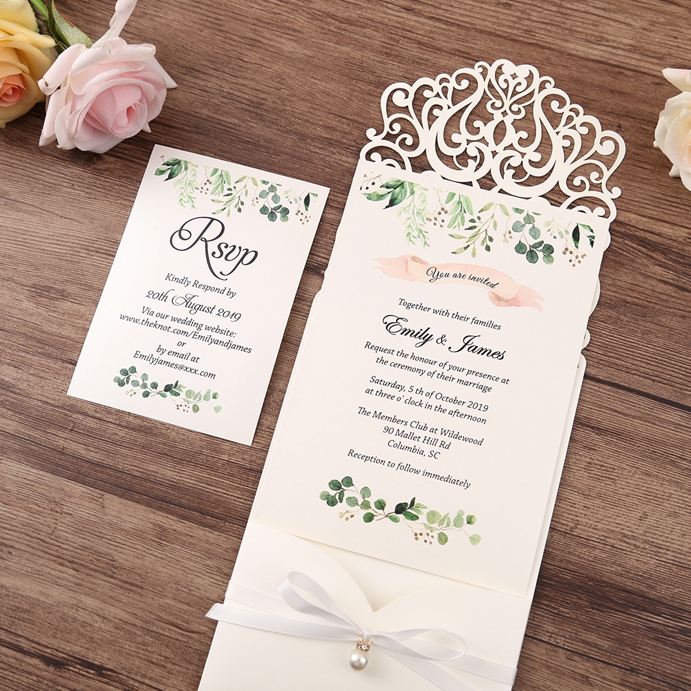 White laser cut invitation with a hanging pearl - Invitationcards